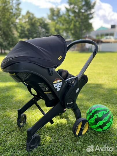 Коляска автокресло Doona с базой isofix