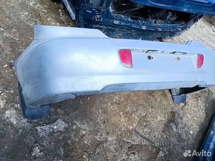 Бампер задний Kia Spectra