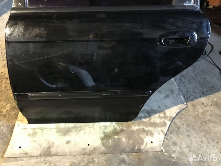 Дверь задняя левая Kia spectra