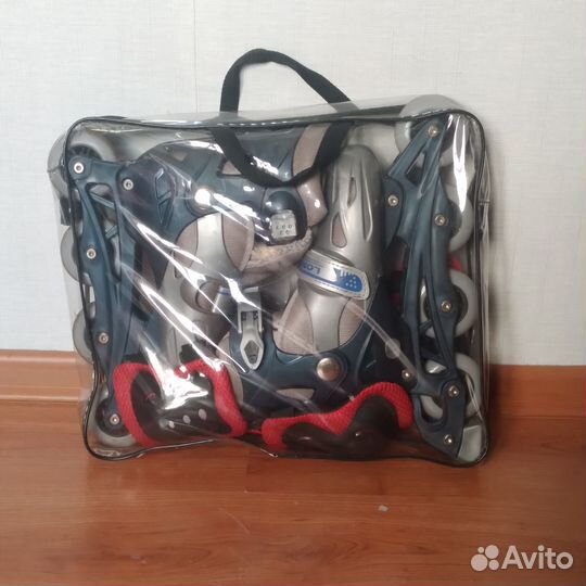 Роликовые коньки