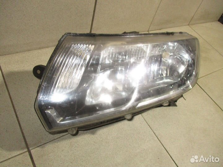 Стекло фары левой Renault Logan 2