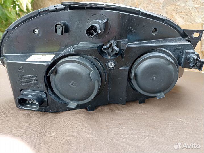 Блок фара Niva Chevrolet левая с чёрным безелем