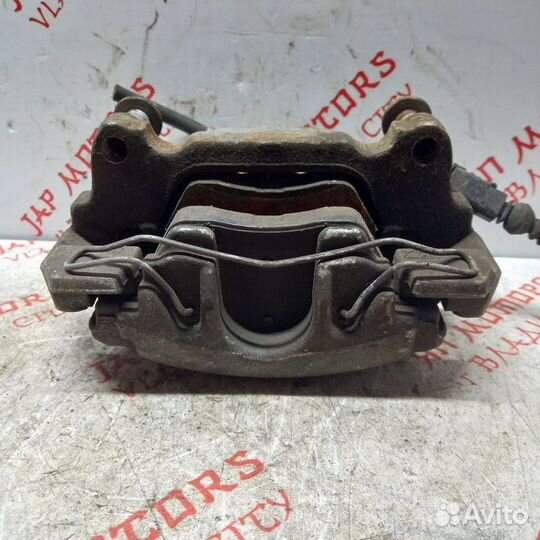 Суппорт тормозной передний левый Volkswagen Touran