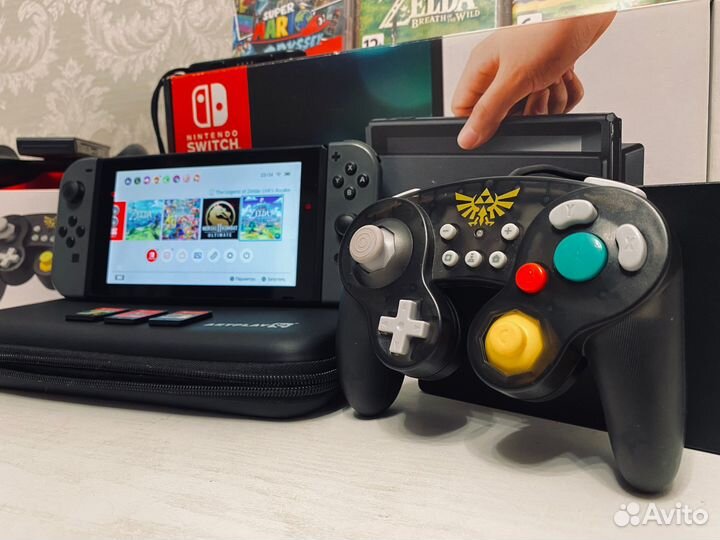 Nintendo Switch + геймпад Zelda + 3 игры + чехол