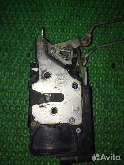 Замок двери передний левый Chevrolet Lacetti F16D3