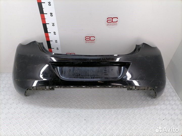 Бампер задний для Opel Astra J 13266587