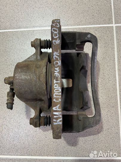 Суппорт передний левый Kia Sportage 2006