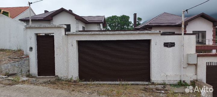 Гаражные секционные ворота дорхан монтаж 1-2 дн