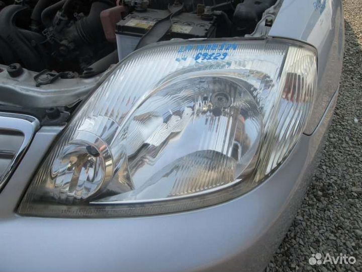 Фара левая Toyota Corolla Fielder NZE124 1NZ-FE