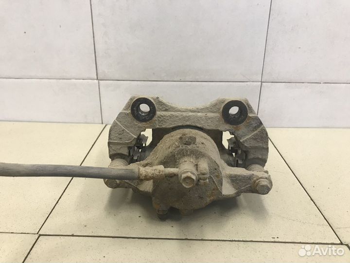 Суппорт передний правый Primera P12E 2002-2007