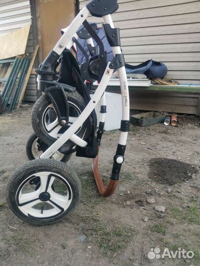 Прогулочная коляска с реверсивным блоком