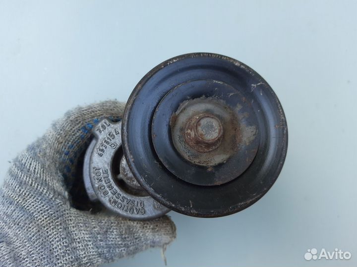 Натяжитель ремня Dodge Caravan 2