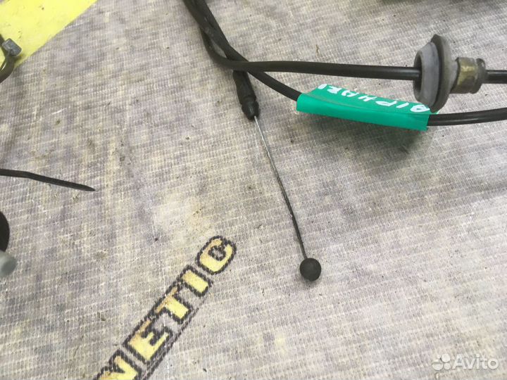 Трос Ручка открывания капота бензобака Alphard H10