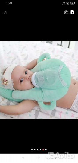 Подушка для кормленияс поддержкой бутылочек