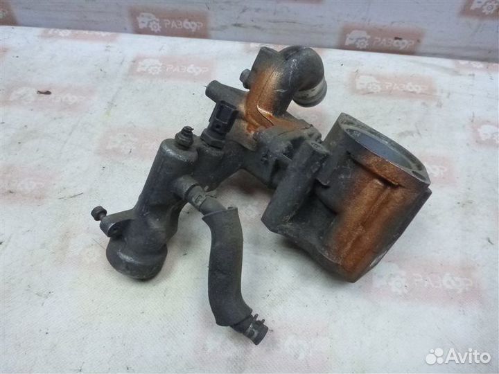 Корпус термостата Mitsubishi Montero Sport K90