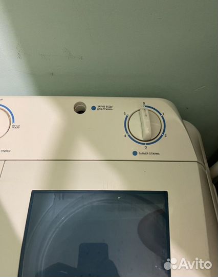 Стиральная машинка с вертикальной загрузкой