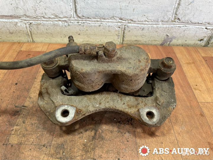 Суппорт тормозной передний левый Peugeot 4007 2009