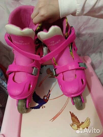 Роликовые коньки