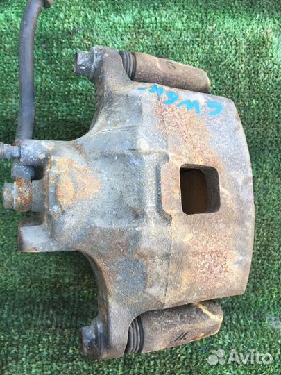 Тормозной суппорт передний левый Mitsubishi