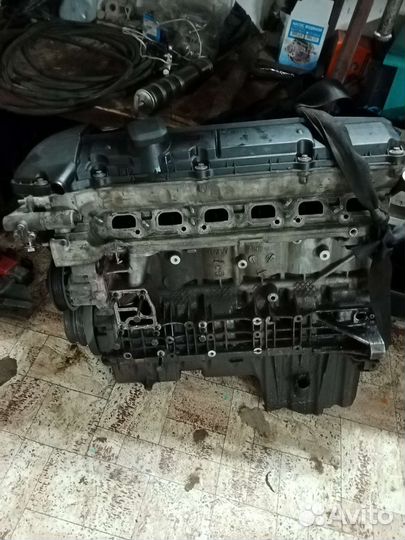 Двигатель м54б25