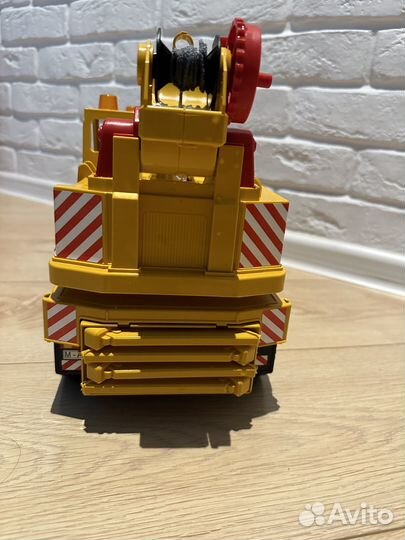 Игрушка Подъемный кран bruder man tc 4500