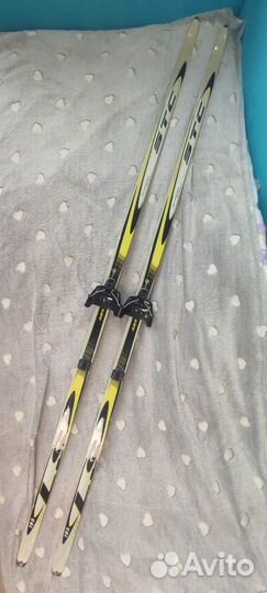 Лыжи беговые. Лыжные палки. Листайте фото