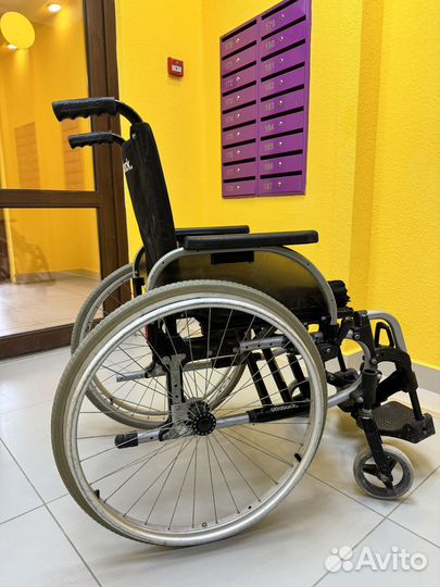 Инвалидная коляска