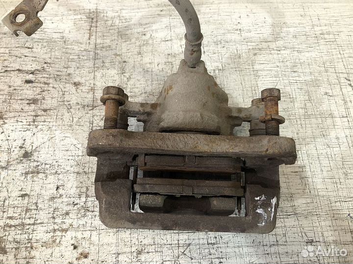 Суппорт тормозной задний Hyundai Getz