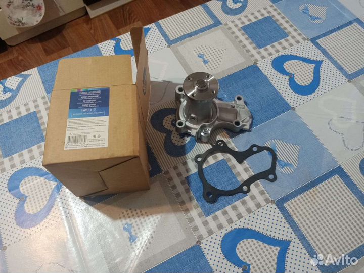 Помпа Mitsubishi Lancer 9