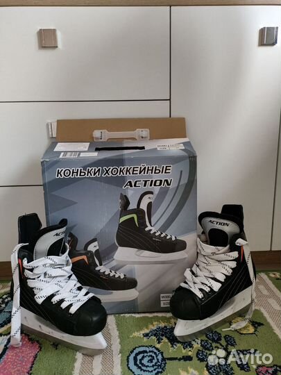 Коньки хоккейные action