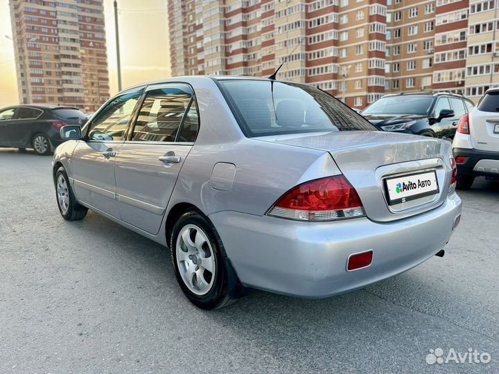 Mitsubishi Lancer 1.6 МТ, 2006, 285 710 км