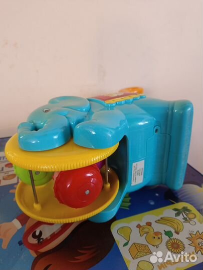 Игрушка каталка с ручкой