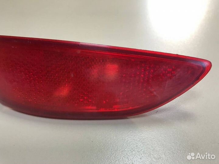 Отражатель в бампер задний левый седан до рест