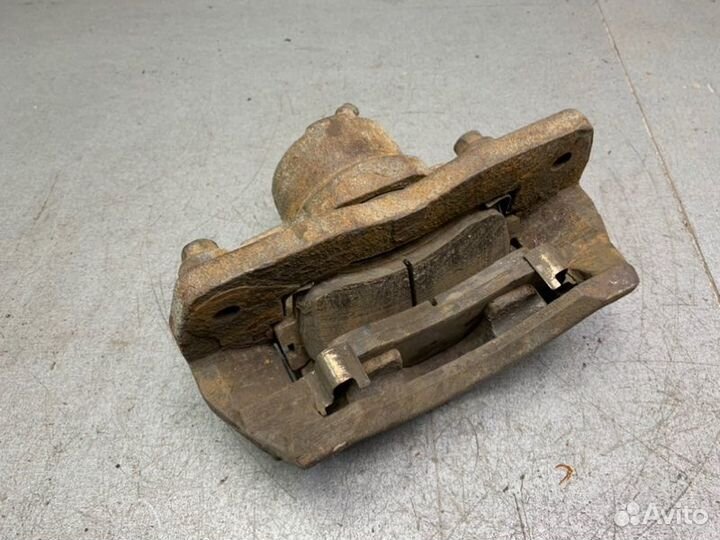 Суппорт тормозной передний правый Kia Spectra