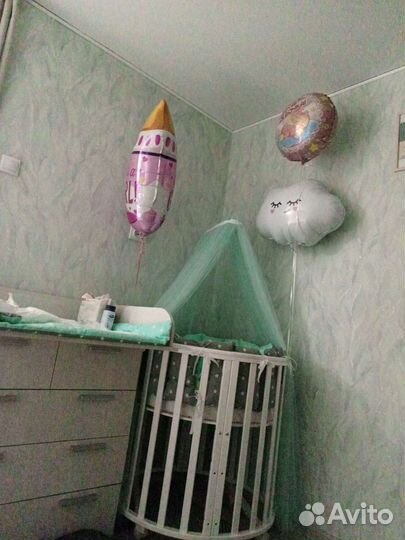 Детская кроватка с маятником круглая