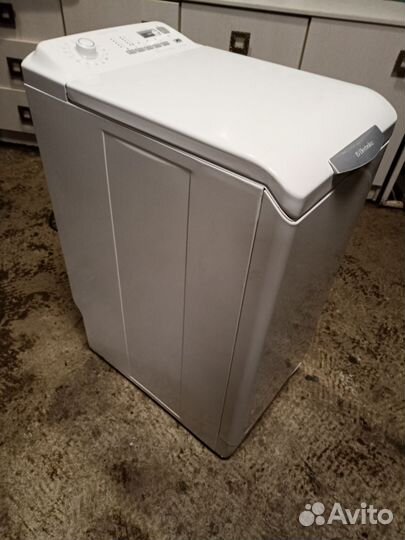 Стиральная машина с вертикальной загрузкой