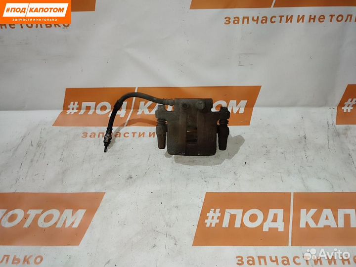 Суппорт тормозной задний левый Mitsubishi Lancer