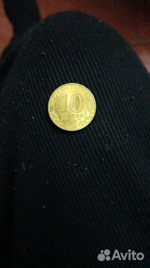 Монета 50 лет первого полета