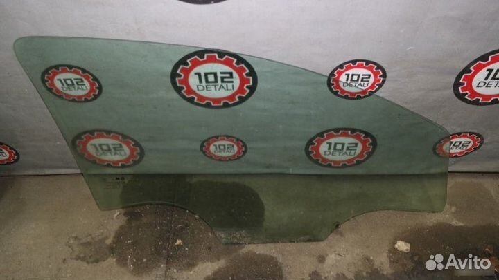 Стекло двери переднее левое Opel Astra H