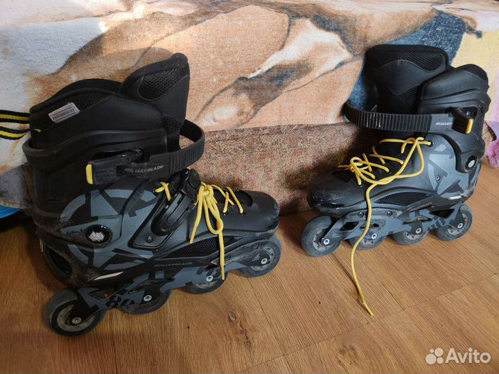 Роликовые коньки