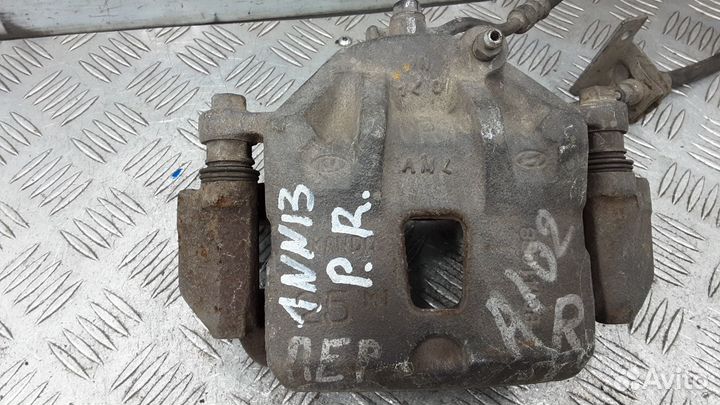 Суппорт передний правый Kia Soul рест. 2012