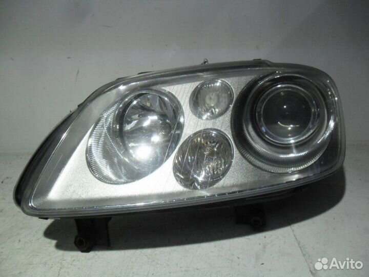 Фара левая Volkswagen Touran 2003