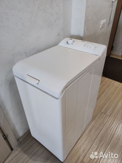 Стиральная машина с вертикальной загрузкой