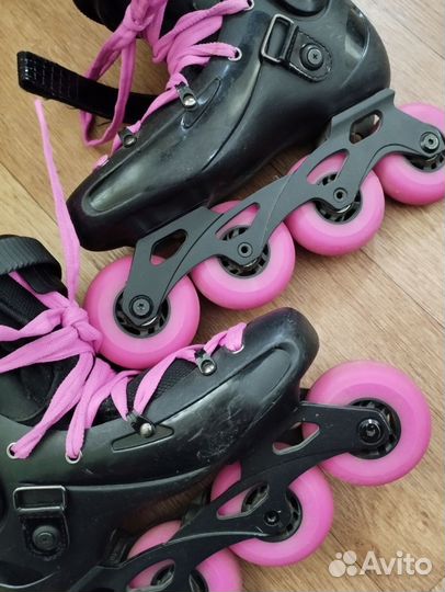 Роликовые коньки