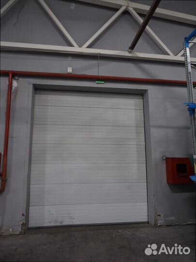 Высокие секционные ворота под ключ