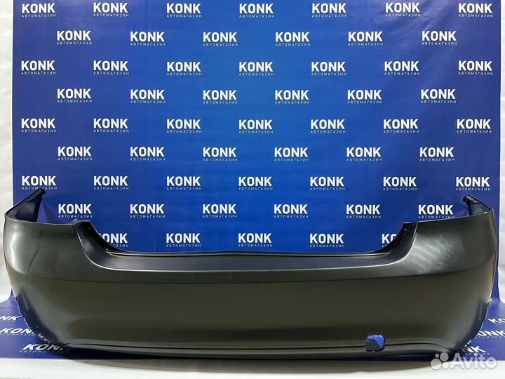 Задний бампер на Форд Фокус 2 седан