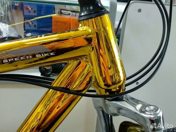 Велосипед на дисках золотой
