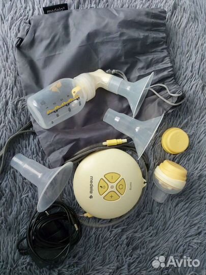 Молокоотсос medela электрический