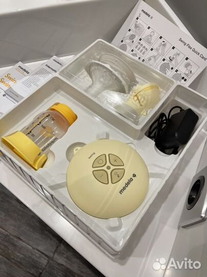 Молокоотсос medela flex swing