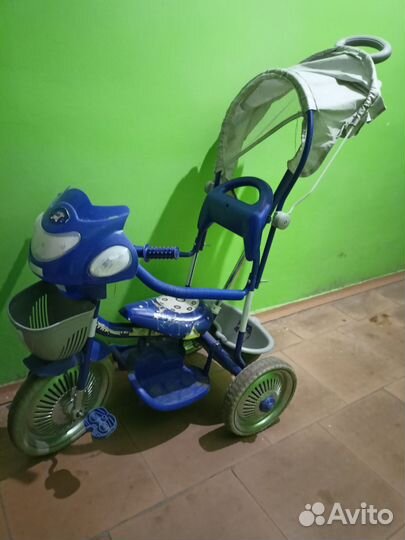 Трехколесный велосипед с ручкой